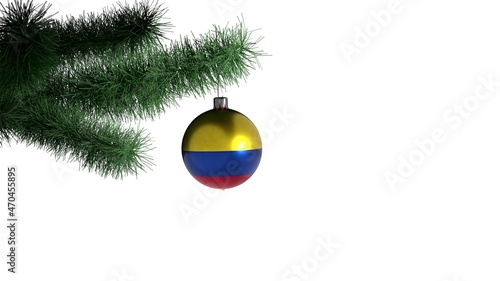 New Year's ball with the flag of Colombia on a Christmas tree branch isolated on white background. Christmas and New Year concept.