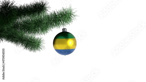 New Year's ball with the flag of Gabon on a Christmas tree branch isolated on white background. Christmas and New Year concept.