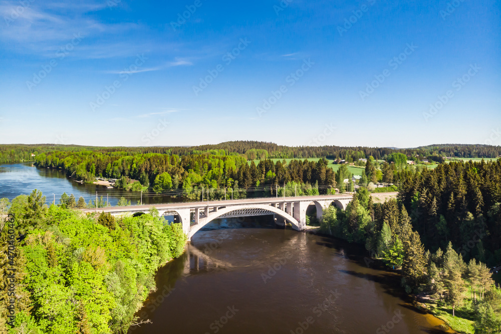 Φωτογραφία Summer aerial view of bridge and Kymijoki river waters in Finland, Kymenlaakso,