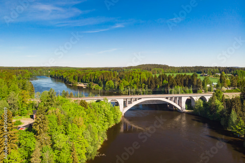 Summer aerial view of bridge and Kymijoki river waters in Finland, Kymenlaakso, Kouvola, Koria