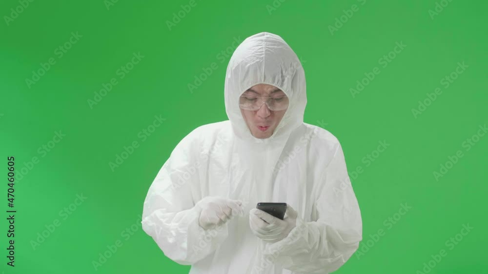 Asian Man Wearing Personal Protective Equipment Uniform Ppe Use Mobile Phone And Say Wow In The Green Screen Studio
Asian Man Wearing Personal Protective Equipment Uniform Ppe Use Mobile Phone And Say Wow In The Green Screen Studio