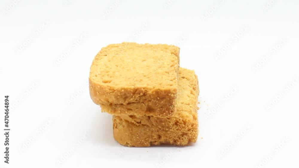 Crispy rusk on white background with selective focus Crispy rusk on white background with selective focus