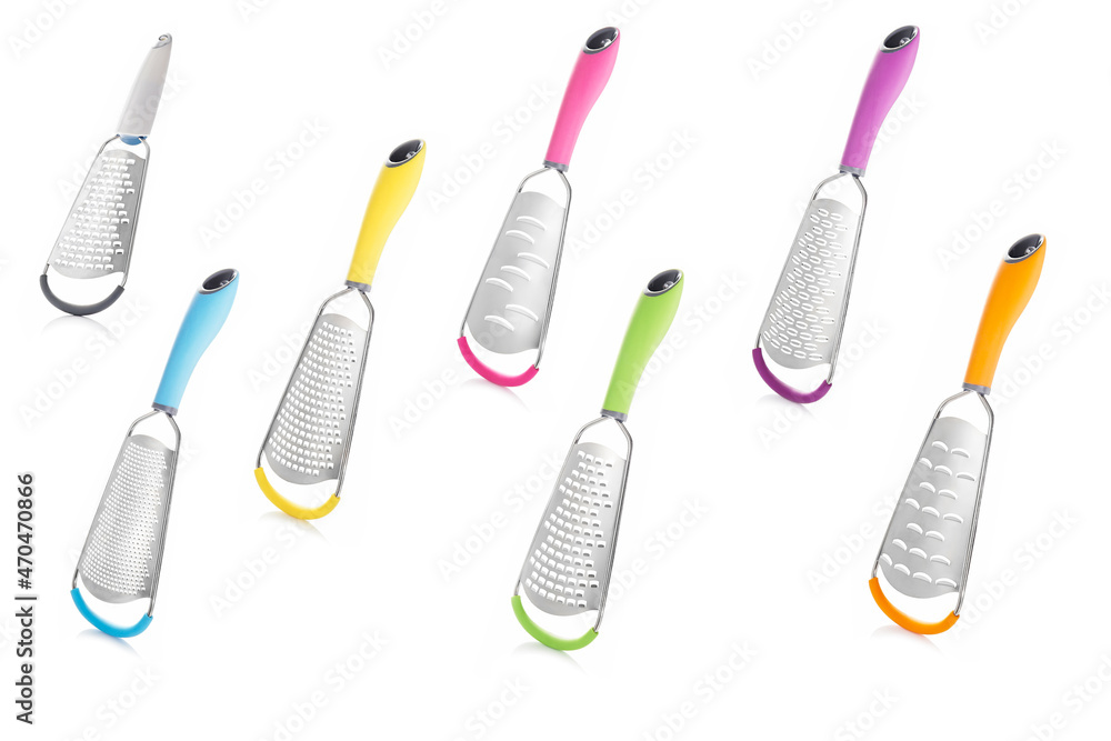 Set of professional graters for vegetables and fruits isolated on a white background. Professional chef cooking tool. The best tools for the kitchen and cooking. Set of professional graters for vegetables and fruits isolated on a white background. Professional chef cooking tool. The best tools for the kitchen and cooking.