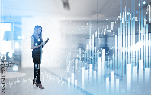 Businesswoman with smartphone in hands, rising bar chart and office room