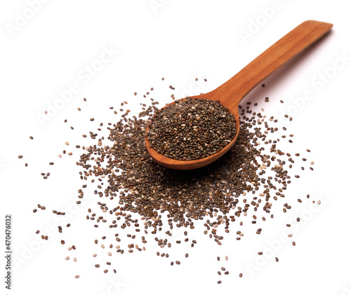 Wooden spoon of organic natural chia seeds close-up isolated