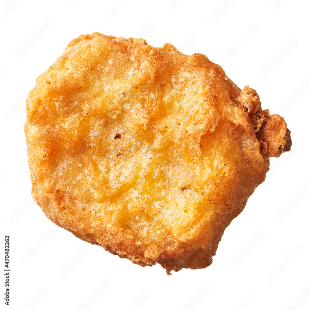 SIngle chicken nugget isolated on a white background SIngle chicken nugget isolated on a white background