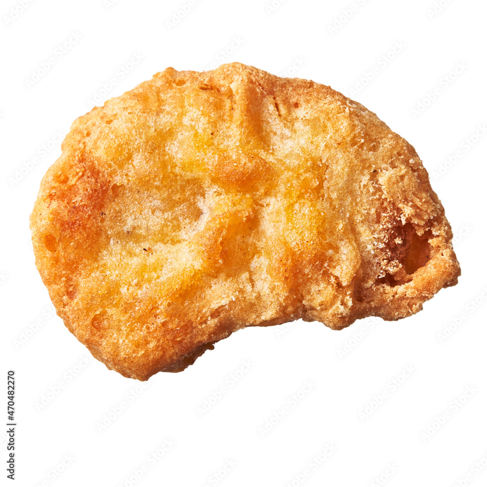 SIngle chicken nugget isolated on a white background SIngle chicken nugget isolated on a white background