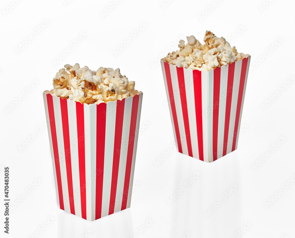  Two packs of salty popcorns isolated on a white background