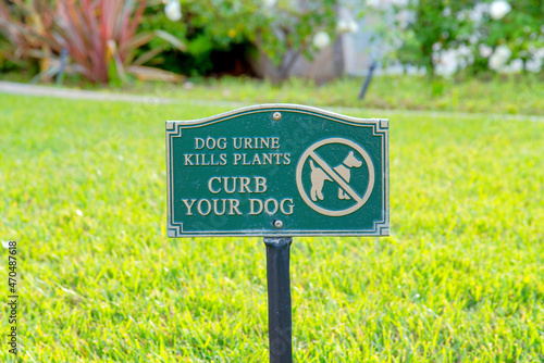 Wallpaper Mural Curb you dog signage on a lawn at La Jolla, California Torontodigital.ca