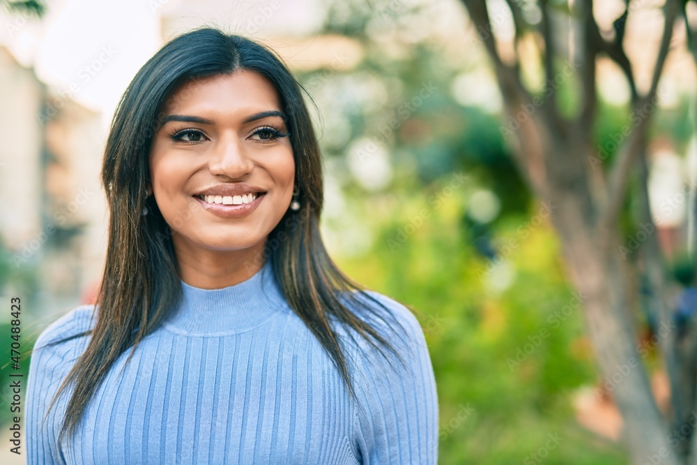 Beautiful hispanic woman smiling confient at the park Beautiful hispanic woman smiling confient at the park
