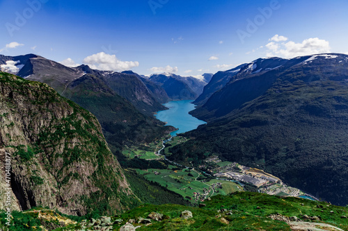 Scenic view on beautiful fjord, town and Norwegian mountains