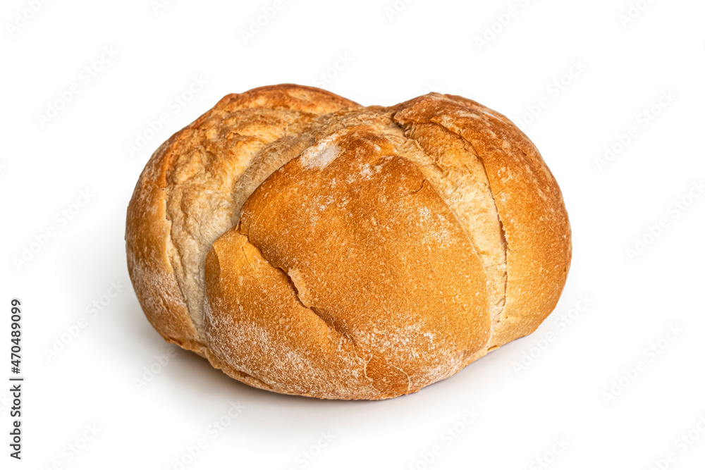 Round bread made of wheat flour, with an appetizing golden crust Round bread made of wheat flour, with an appetizing golden crust