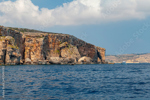 Natural stone arch on a coast of Comino island, Malta © evannovostro