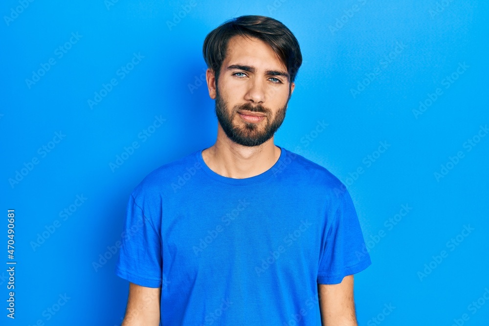 Young hispanic man wearing casual clothes looking sleepy and tired, exhausted for fatigue and hangover, lazy eyes in the morning. Young hispanic man wearing casual clothes looking sleepy and tired, exhausted for fatigue and hangover, lazy eyes in the morning.