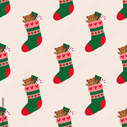 Christmas stockings with gifts, vector seamless pattern