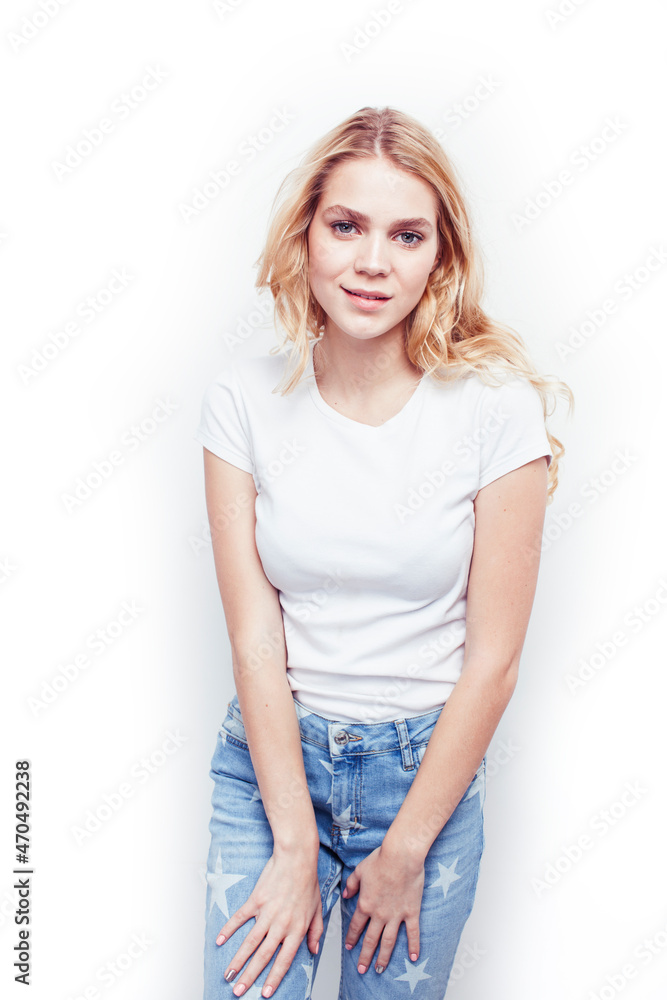 young pretty stylish blond hipster girl posing emotional isolated on white background happy smiling cool smile, lifestyle people concept young pretty stylish blond hipster girl posing emotional isolated on white background happy smiling cool smile, lifestyle people concept
