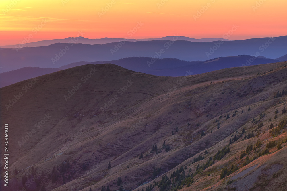 orange sunset in the mountains of Ukraine