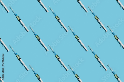 Wallpaper Mural Syringe pattern on blue background. Torontodigital.ca