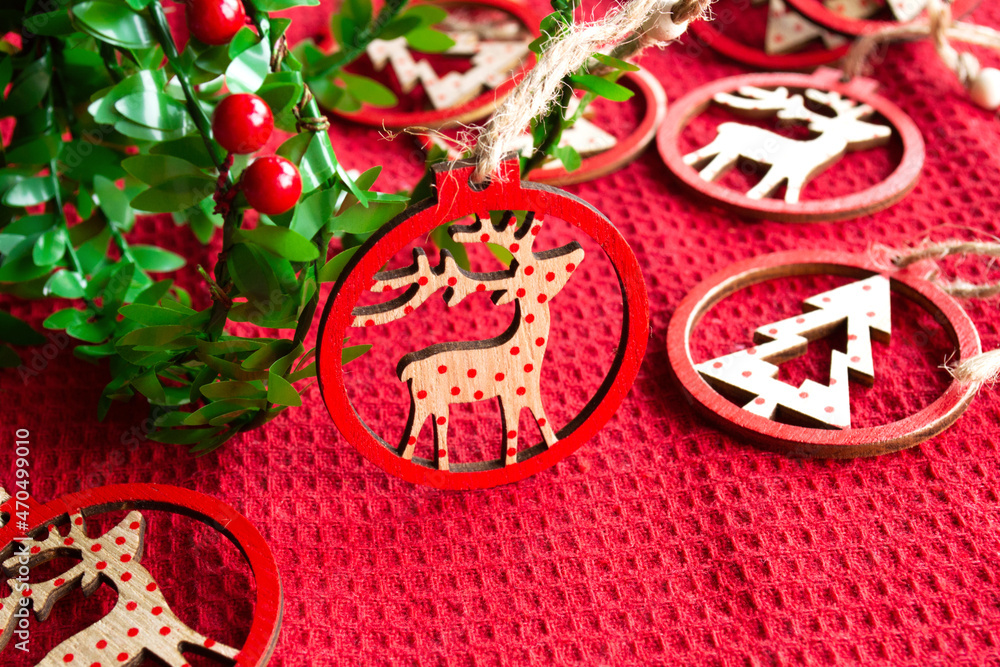 Wooden decorations with deer and fir tree for Christmas 