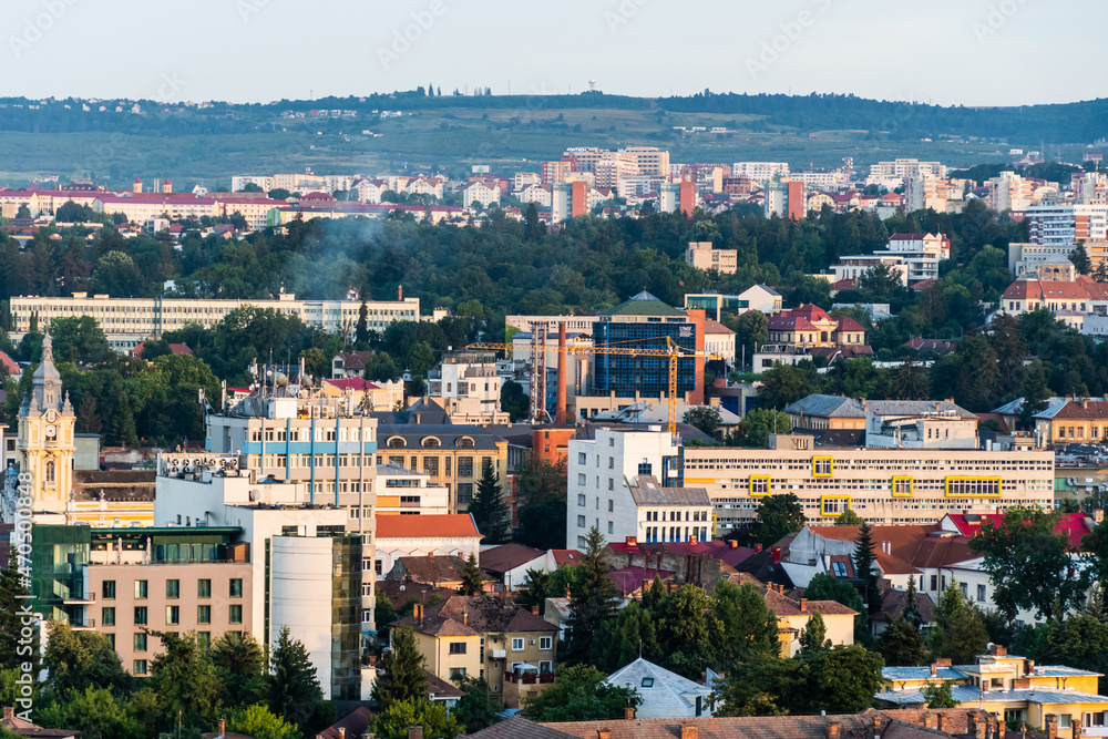 Aerial view over the city on the sunset with the University of Medicine and Pharmacy. Cluj Napoca, Romania.