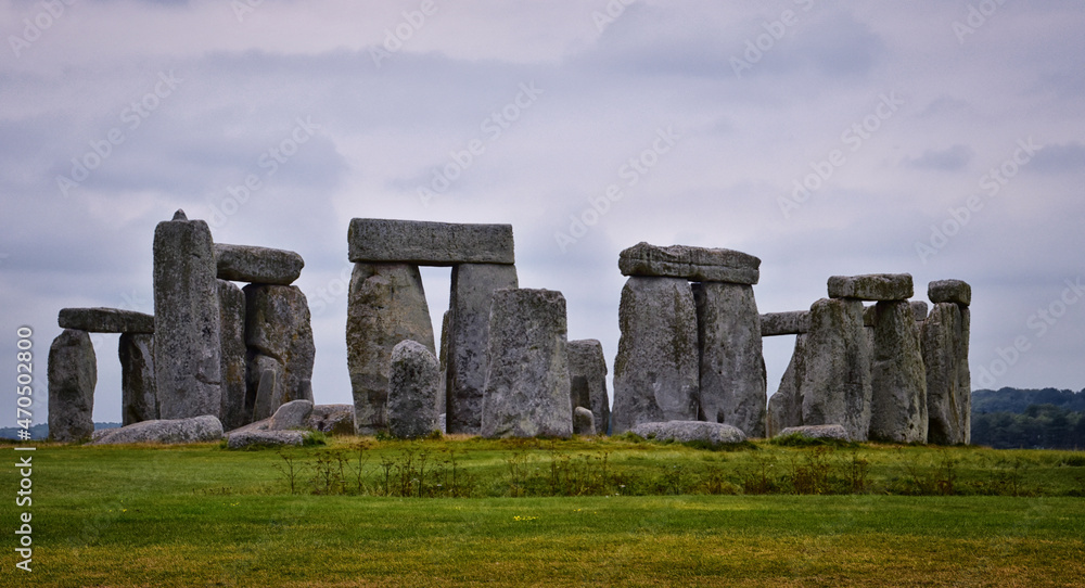 Naklejka premium Stonehenge prehistoric monument on Salisbury Plain in Wiltshire, England, United Kingdom, September 13, 2021. A ring circle of henge megalithic stones, heel stone, bluestone trilithons, UK.