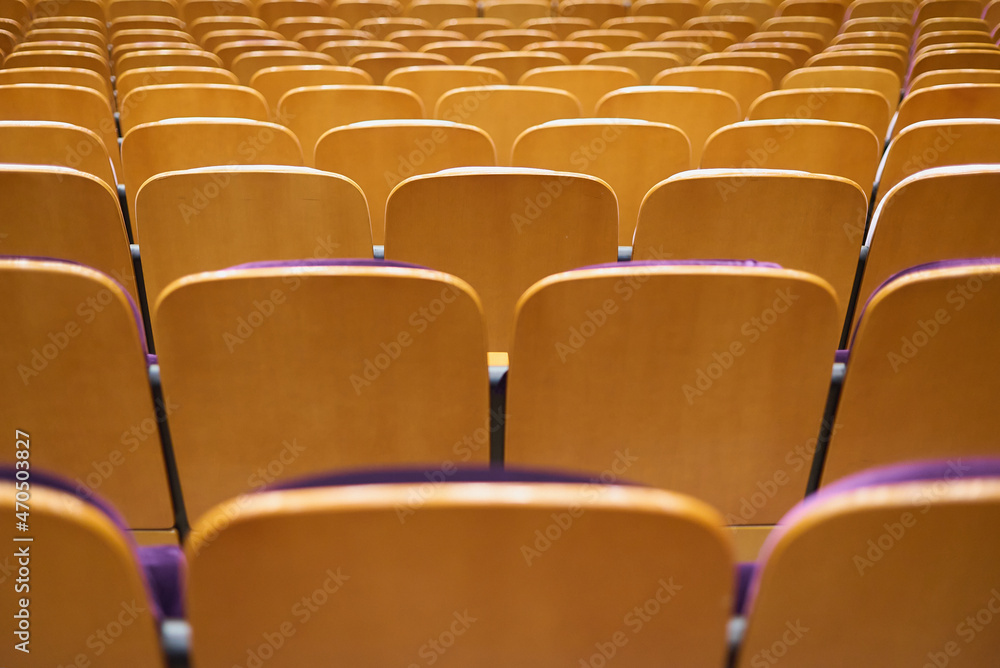 Obraz premium Upholstered chairs in an empty concert hall. Pandemic