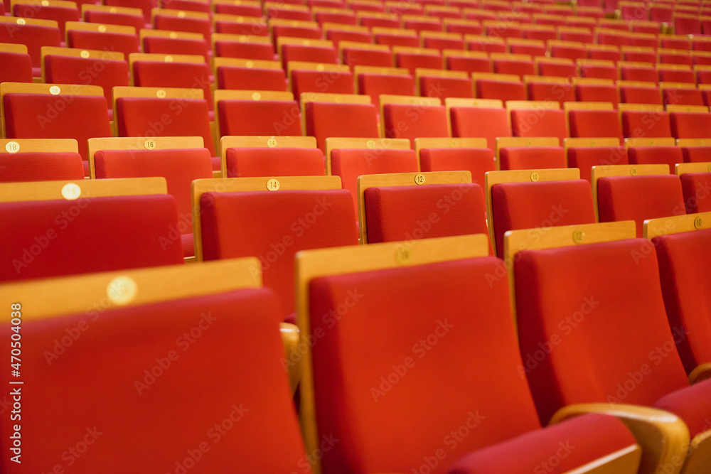 Obraz premium Upholstered chairs in an empty concert hall. Pandemic