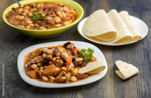 Mexican style beans served with tortilla