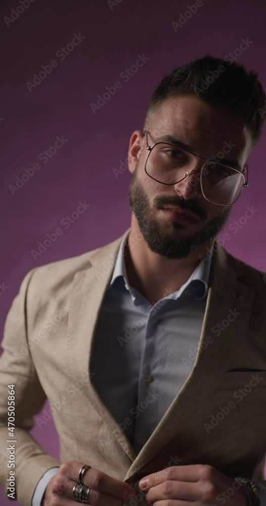 smart casual businessman closing his jacket and gesturing talk to the hand smart casual businessman closing his jacket and gesturing talk to the hand