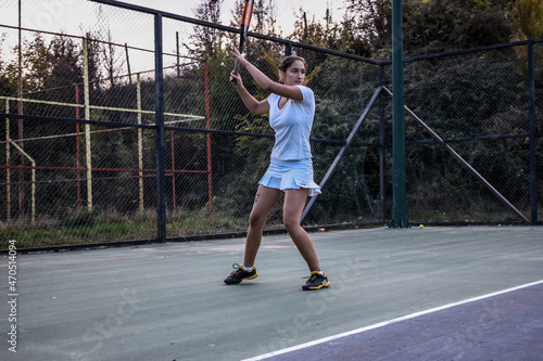 Tennis player outside female  © Latino Photography