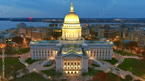 Beautiful Madison Wisconsin State Capitol Building at night, this is the people's house. Its architecture and grandeur make it easy to mistake for the US Capital, dynamic moving aerial view.
 photo