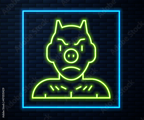 Glowing neon line Krampus, heck icon isolated on brick wall background. Horned devil. Traditional Christmas devil. Happy Halloween party. Vector