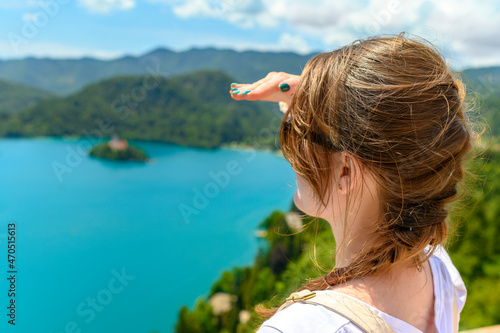 Tourist Woman Enjoying View of Lake Bled
