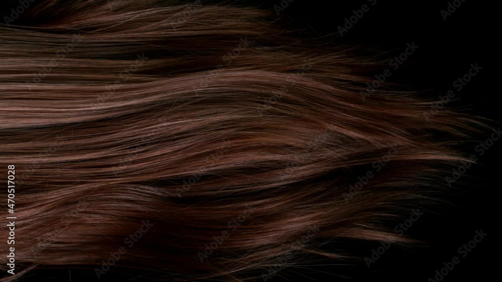 Super slow motion of beautiful healthy long smooth flowing brown hair. Filmed on high speed cinematic camera at 1000 fps. Super slow motion of beautiful healthy long smooth flowing brown hair. Filmed on high speed cinematic camera at 1000 fps.