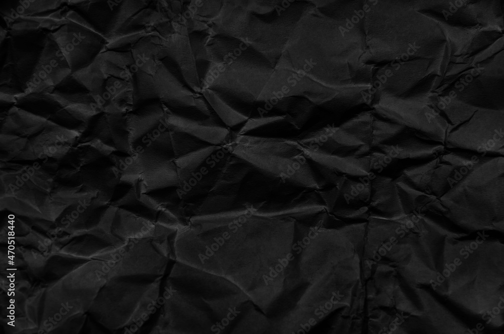 Crumpled black paper for background image Crumpled black paper for background image