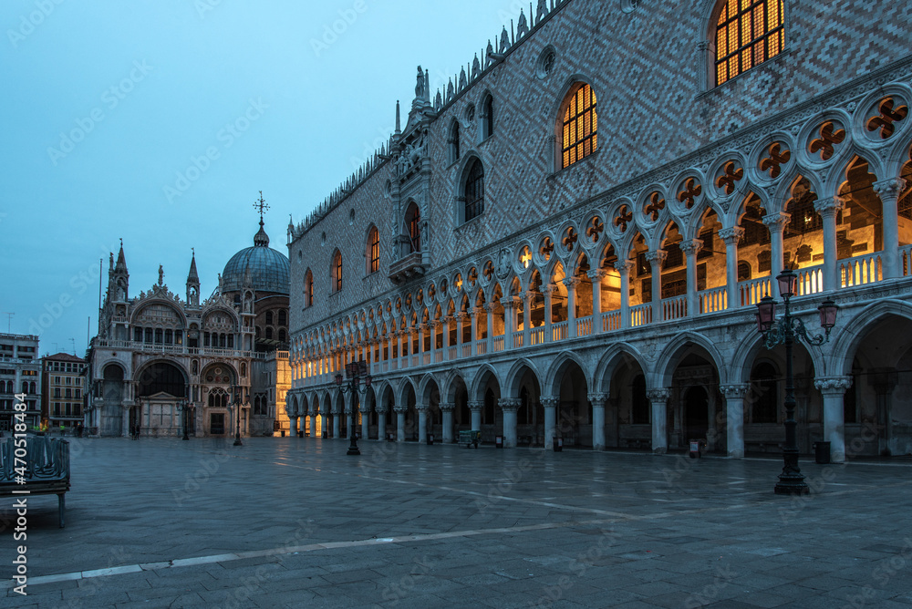 Illuminated Doge Palace in Venice in the early morning