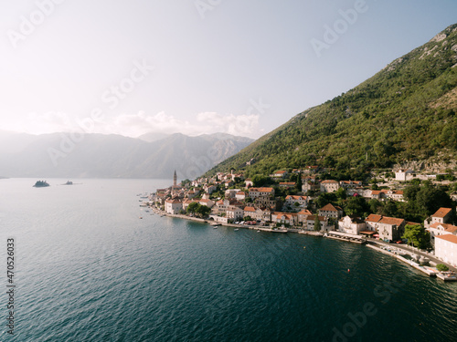 Perast coast at the foot of the green mountain. Montenegro
