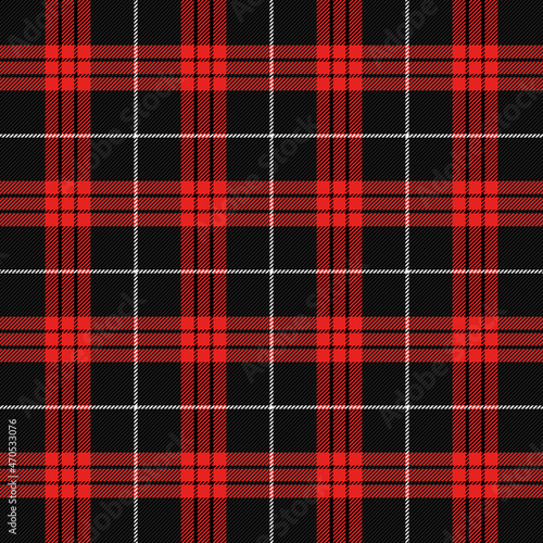 Christmas and new year tartan plaid. Scottish pattern in red, black and green cage. Scottish cage. Traditional Scottish checkered background. Seamless fabric texture. Vector illustration