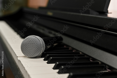 Canvas Print microphone for singing on the keys of an electronic digital piano