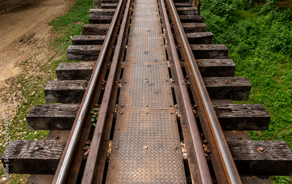 Railway tracks leading from the bridge over the River Kwai near Kanchanaburi Thailand Railway tracks leading from the bridge over the River Kwai near Kanchanaburi Thailand