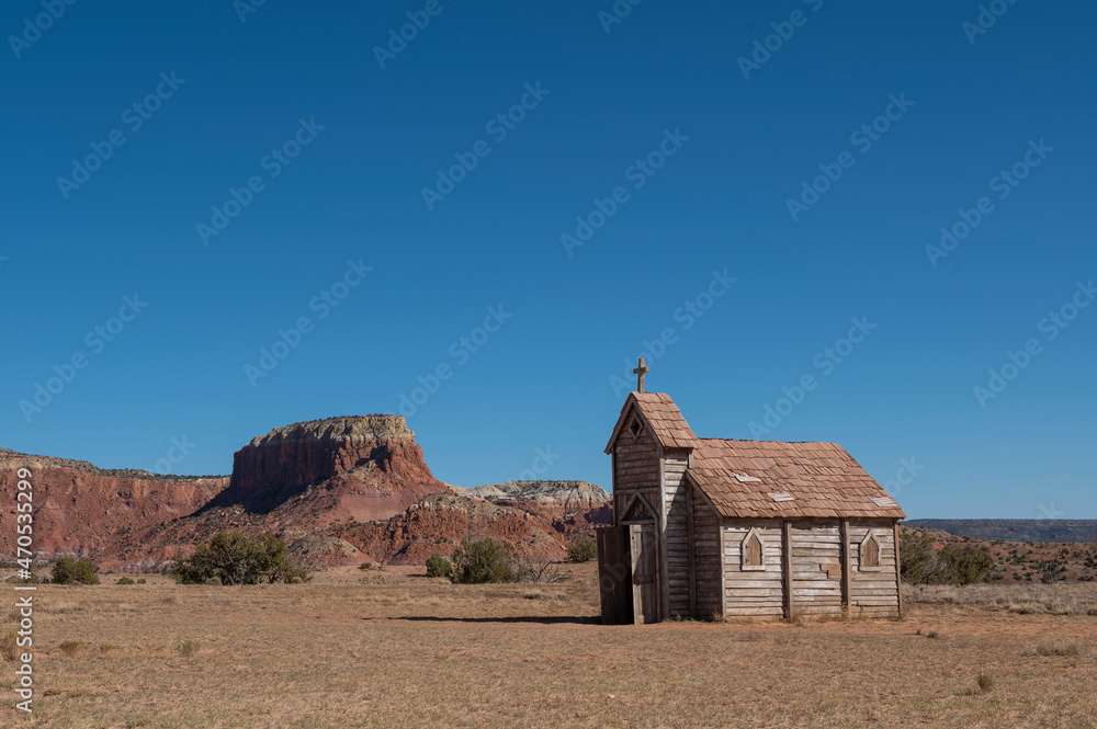 Small rural church in New Mexico with blue skies Small rural church in New Mexico with blue skies