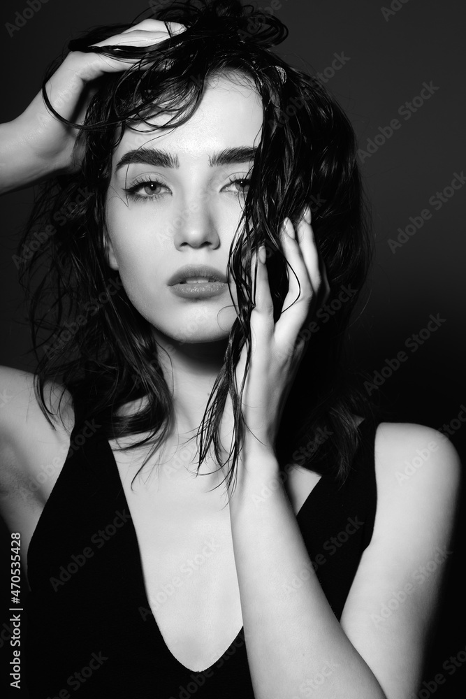 Perfect woman face portrait. Beauty sexy brunette model female with beautiful skin. Manicure, beautiful nails. Girl in fashionable gloves Perfect woman face portrait. Beauty sexy brunette model female with beautiful skin. Manicure, beautiful nails. Girl in fashionable gloves