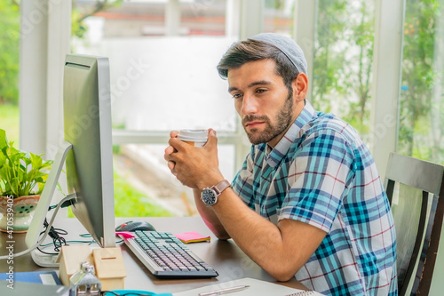 muslim freelance businessman working at home