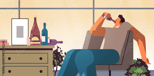 sad man drinker with bottles alcoholic drinking alone depressed addicted drunk guy having problem alcohol addiction