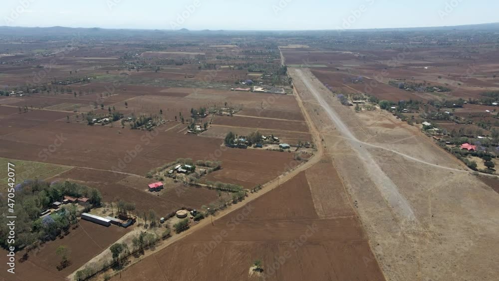 Aerial overview of an old abonded airstrip in rural Kenya Aerial overview of an old abonded airstrip in rural Kenya