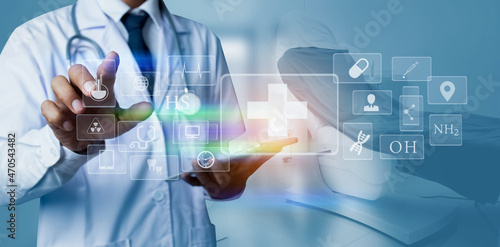 Medicine doctor using digital healthcare and network connection on hologram modern virtual screen interface icons, Medical technology futuristic concept.