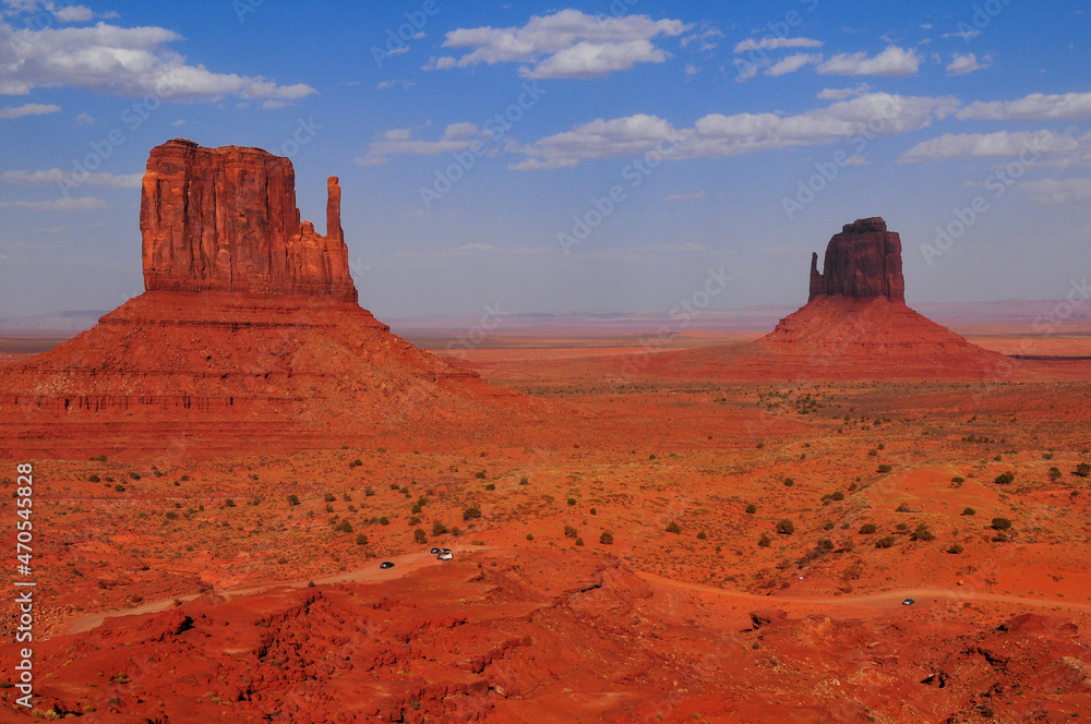 The West and East Mitten Buttes from a viewpoint near the entrance to the Monument Valley Navajo Tribal Park, Arizona, USA The West and East Mitten Buttes from a viewpoint near the entrance to the Monument Valley Navajo Tribal Park, Arizona, USA