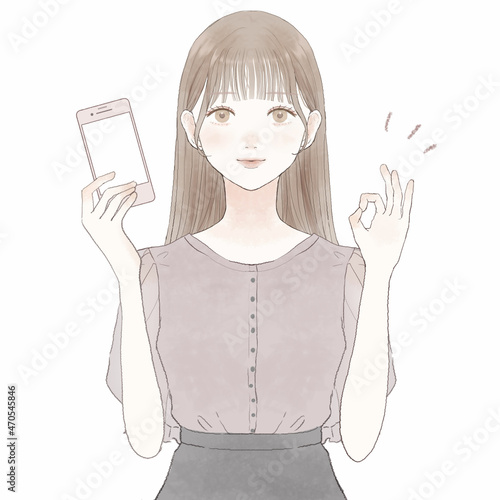 スマホを持ってOKサインを出している女性