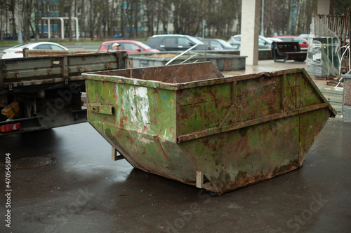 Container for garbage in the suburbs. Garbage can for waste.