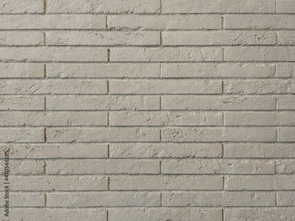 Gray, brick texture. A brick wall. Grey background with horizontal brickwork. Gray, brick texture. A brick wall. Grey background with horizontal brickwork.